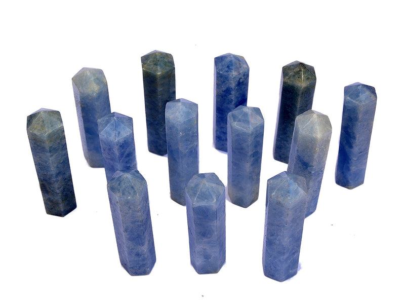 Several blue calcite tower stones 90mm on white background
