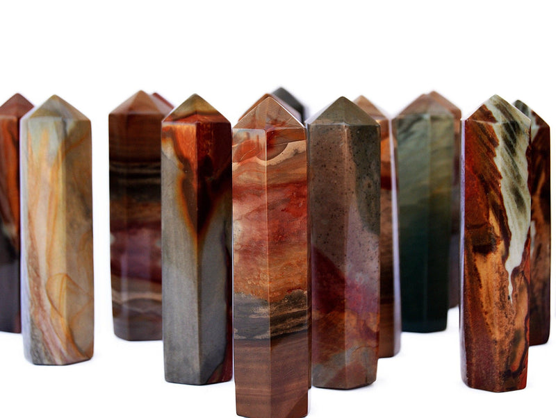 Several polychrome jasper towers 90mm on white background