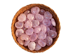 Several pink quartz heart crystals 30mm inside a bowl