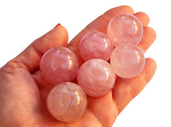 Several rose quartz crystal spheres 25mm - 40mm on hand